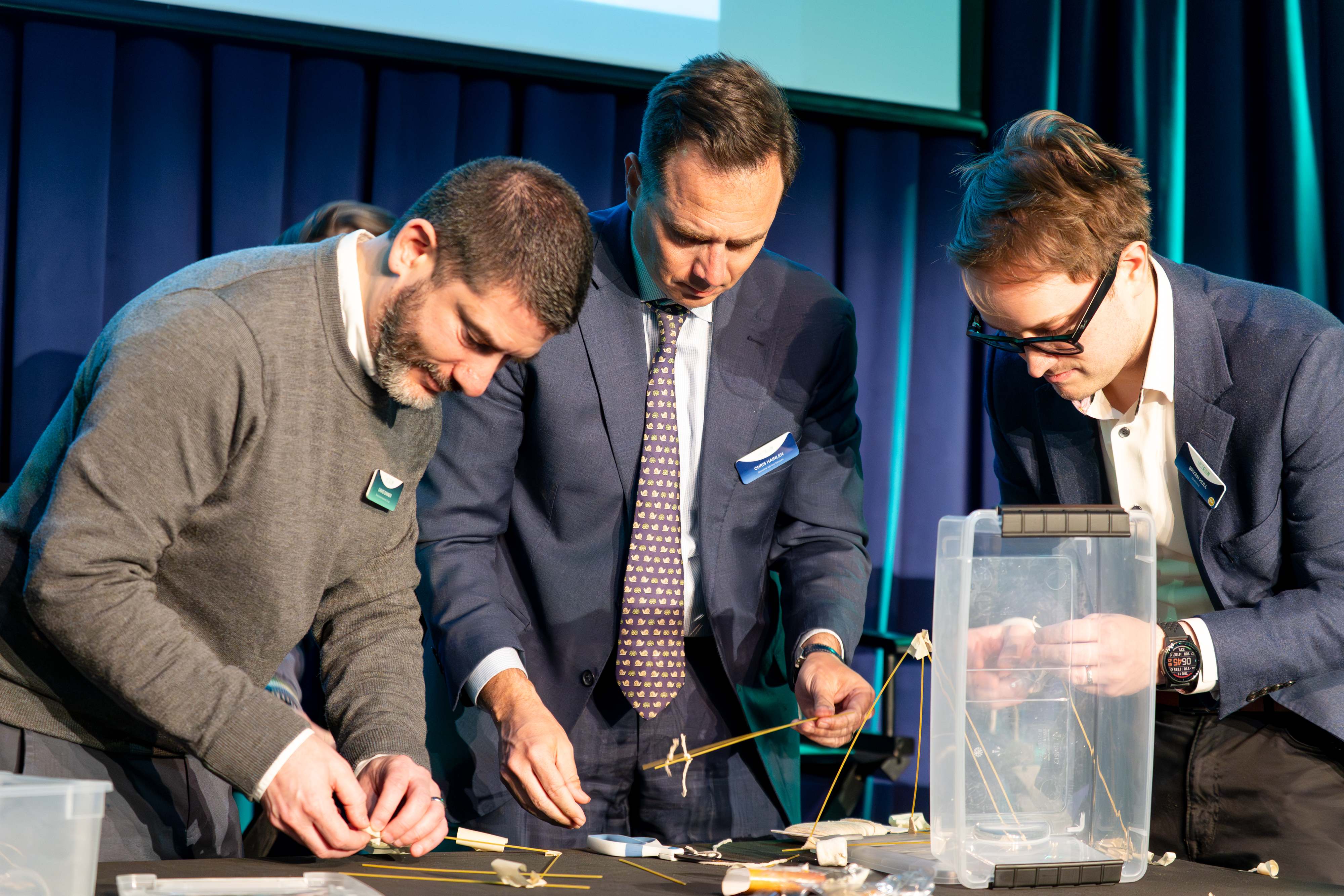 3/4's of Team HFTC, hard at work!  (A.J. was hard at work battling a roll of tape just out of the picture)